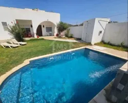 Villa Avec Piscine et Jardin à Hammamet sud à Vendre 51355351