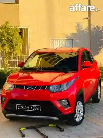 Mahindra Kuv100 k8 - Vue 12