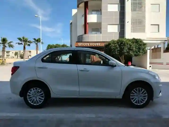 Suzuki Dzire GL EN État Neuf - Vue 1