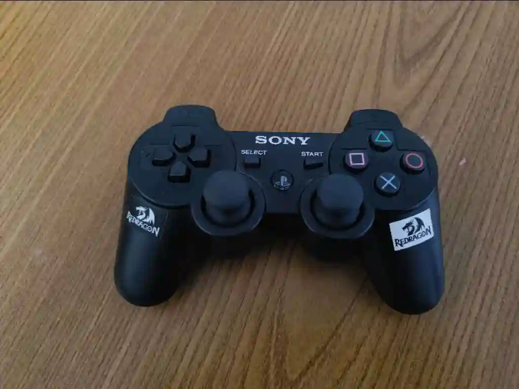 PS3 Slim Avec une Manette Originale - Vue 7