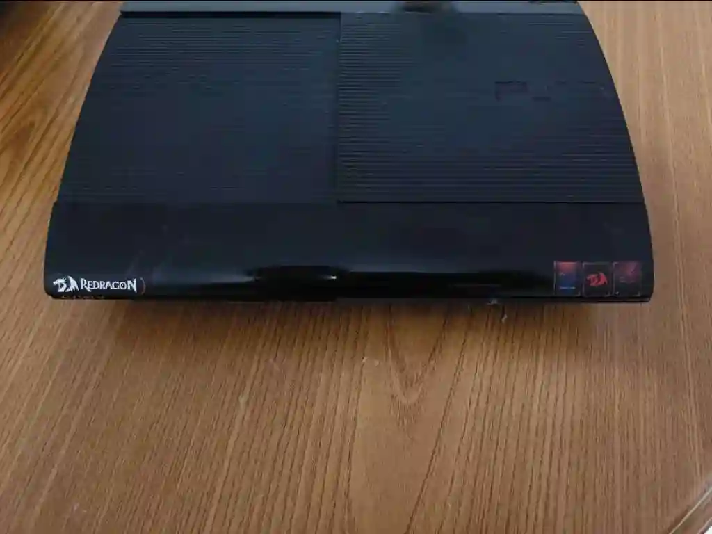 PS3 Slim Avec une Manette Originale - Vue 9