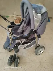 A Vendre Poussette en bon État